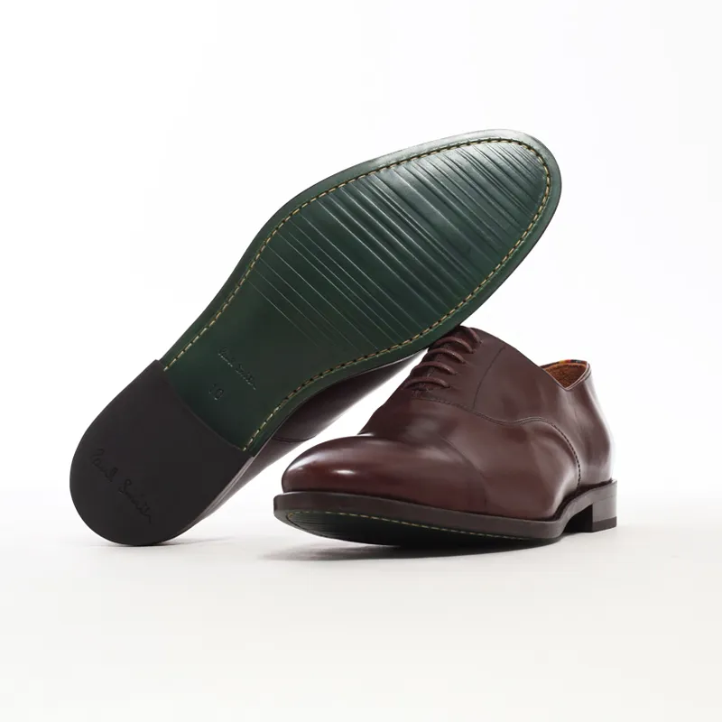 A pair of formal brown shoes