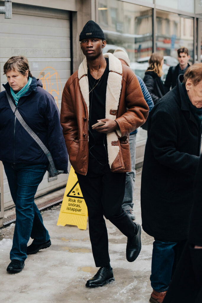 Man walking wearing Scandinavian style clothing