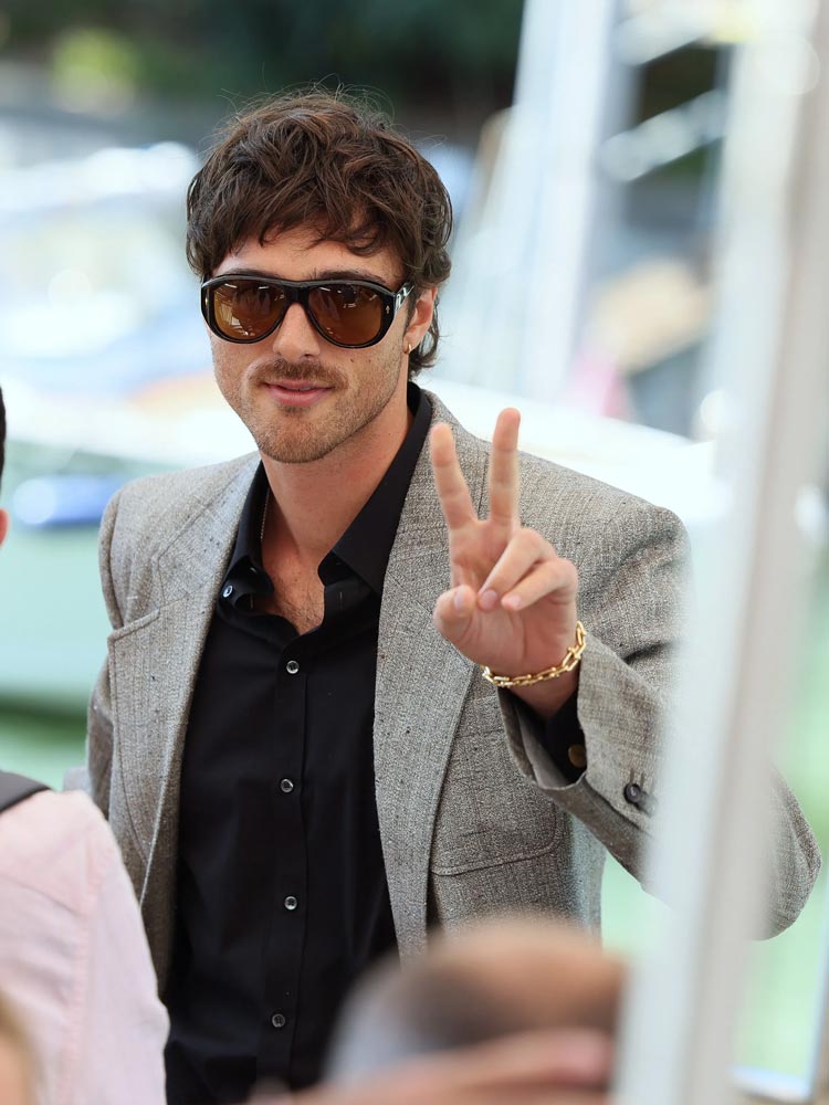 Jacob Elordi posing in sunglasses