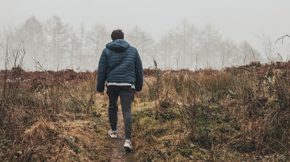 Man walking in field