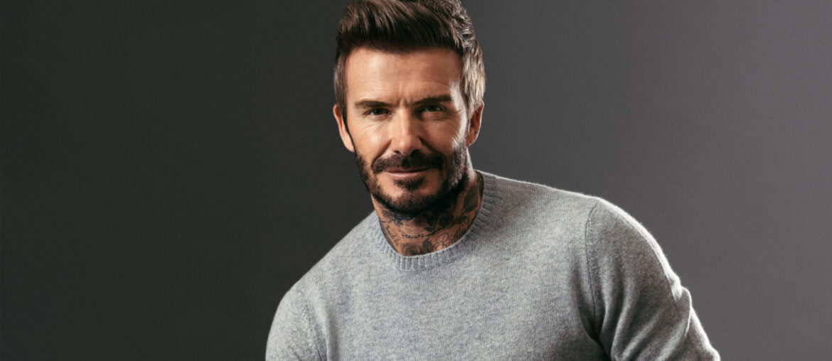 David Beckham wearing a grey pullover