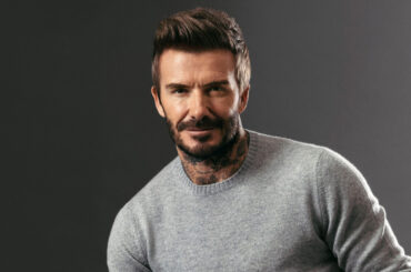 David Beckham wearing a grey pullover