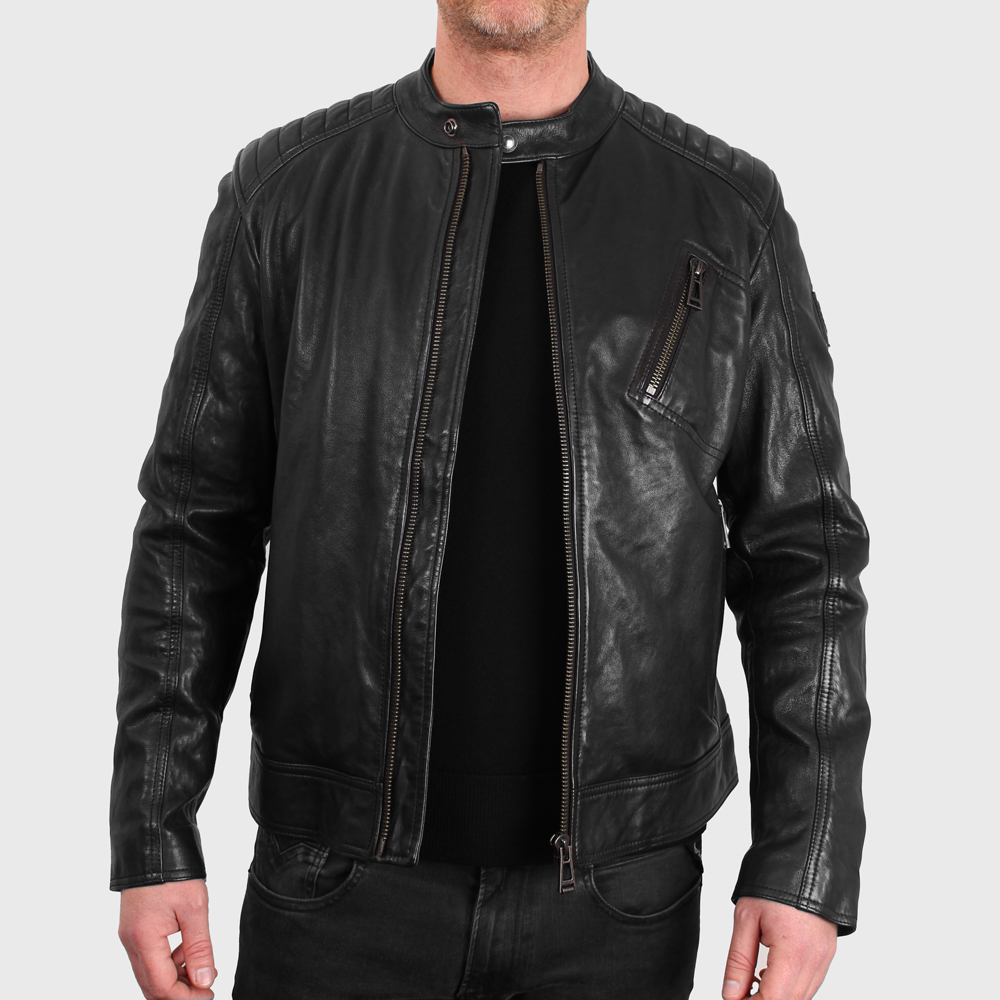 Man wearing a leather jacket with a black t-shirt underneath