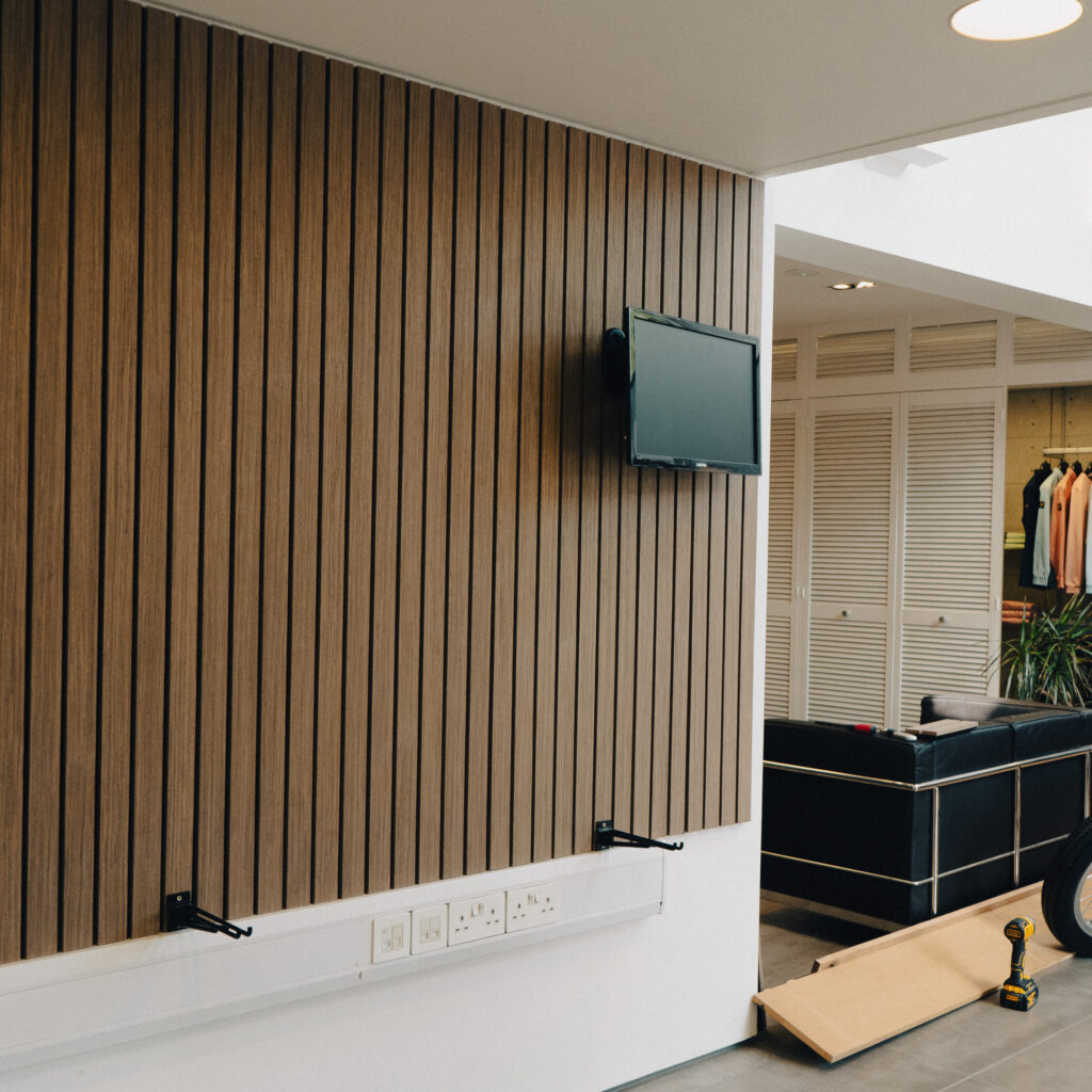 Image of wall with tv mounted to it