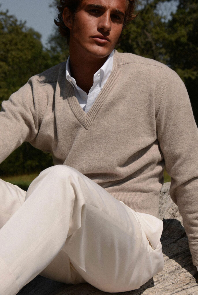 A smartly dressed man posing for a photo