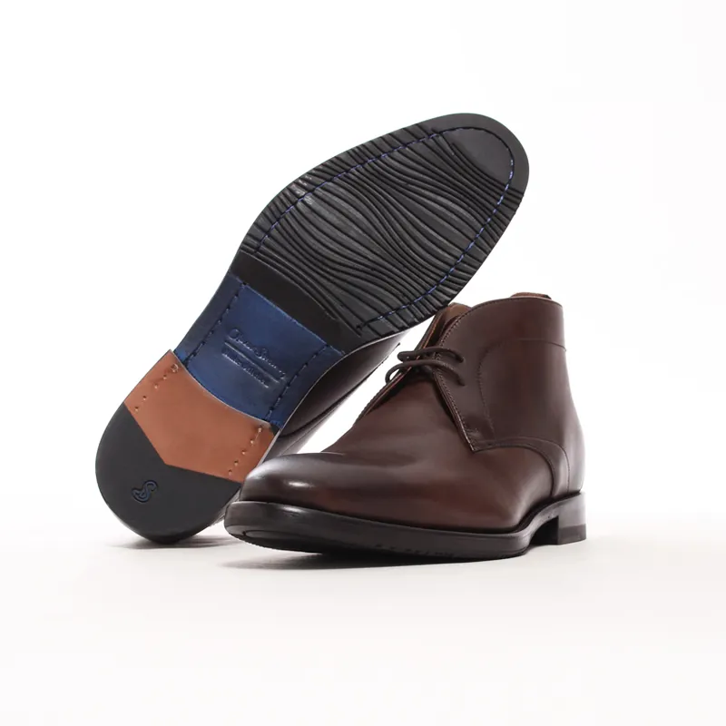 a single boot with another on top